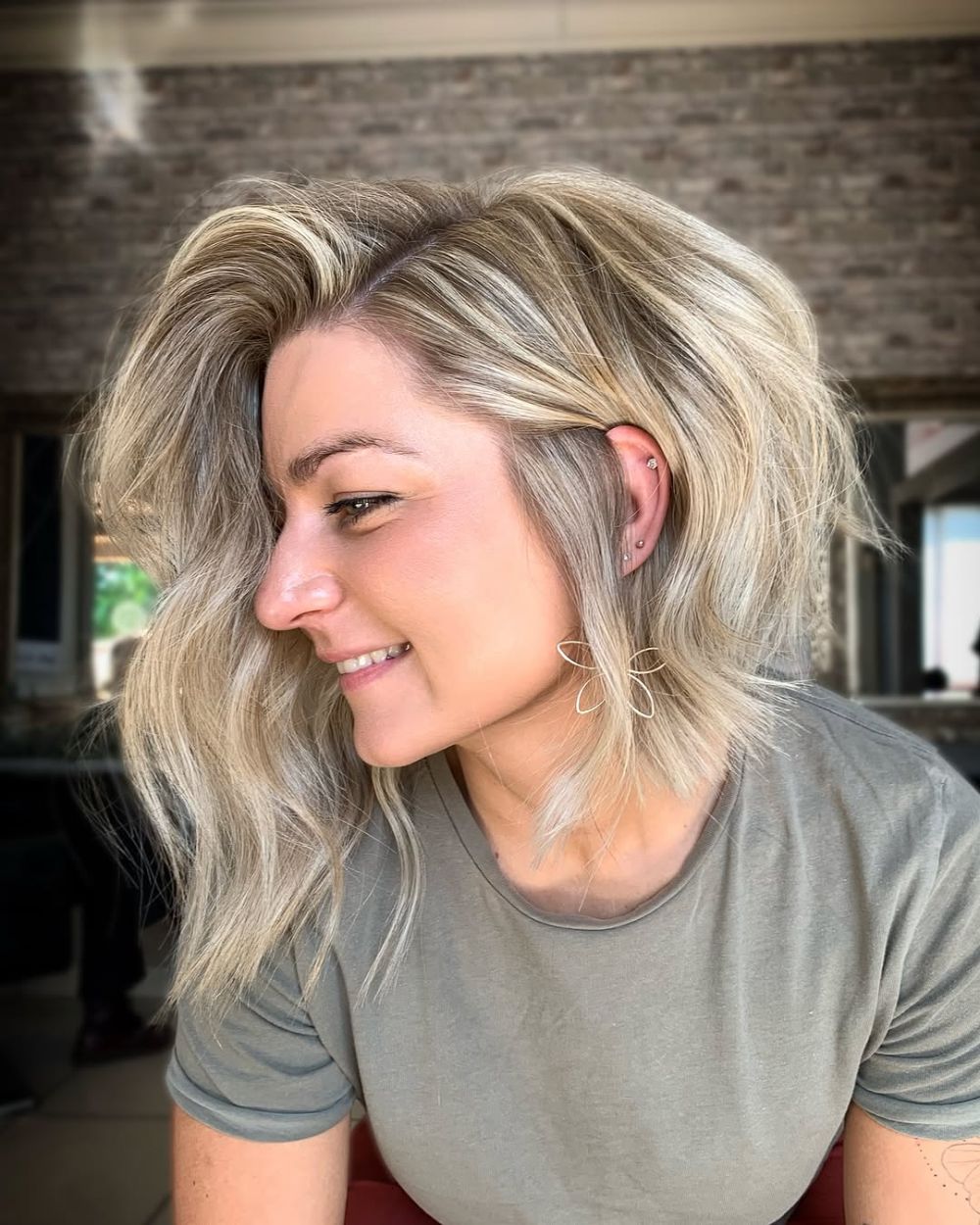 3. Textured Choppy Bob with Blonde Highlights