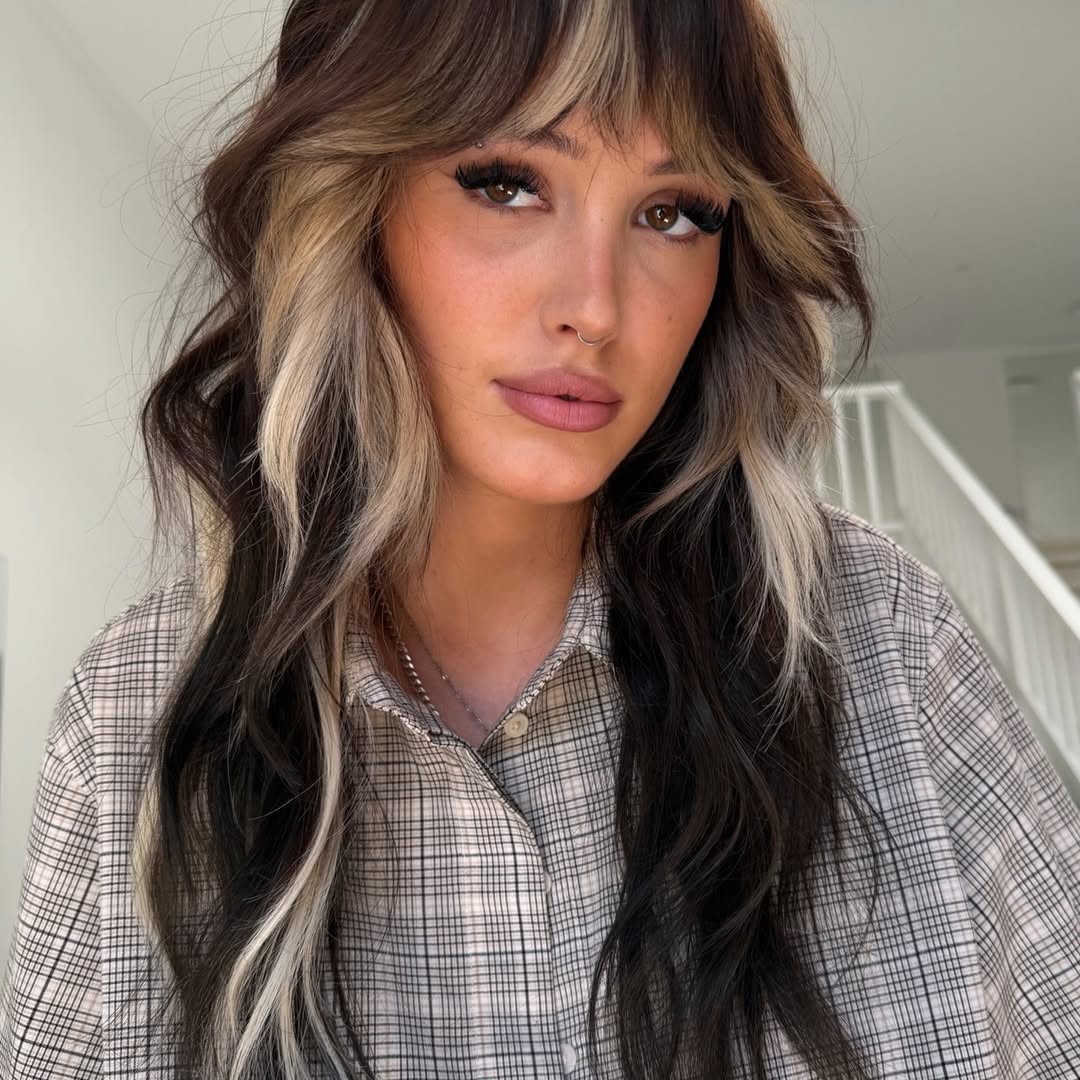 29. Chunky Blonde Money Piece with Wispy Fringe