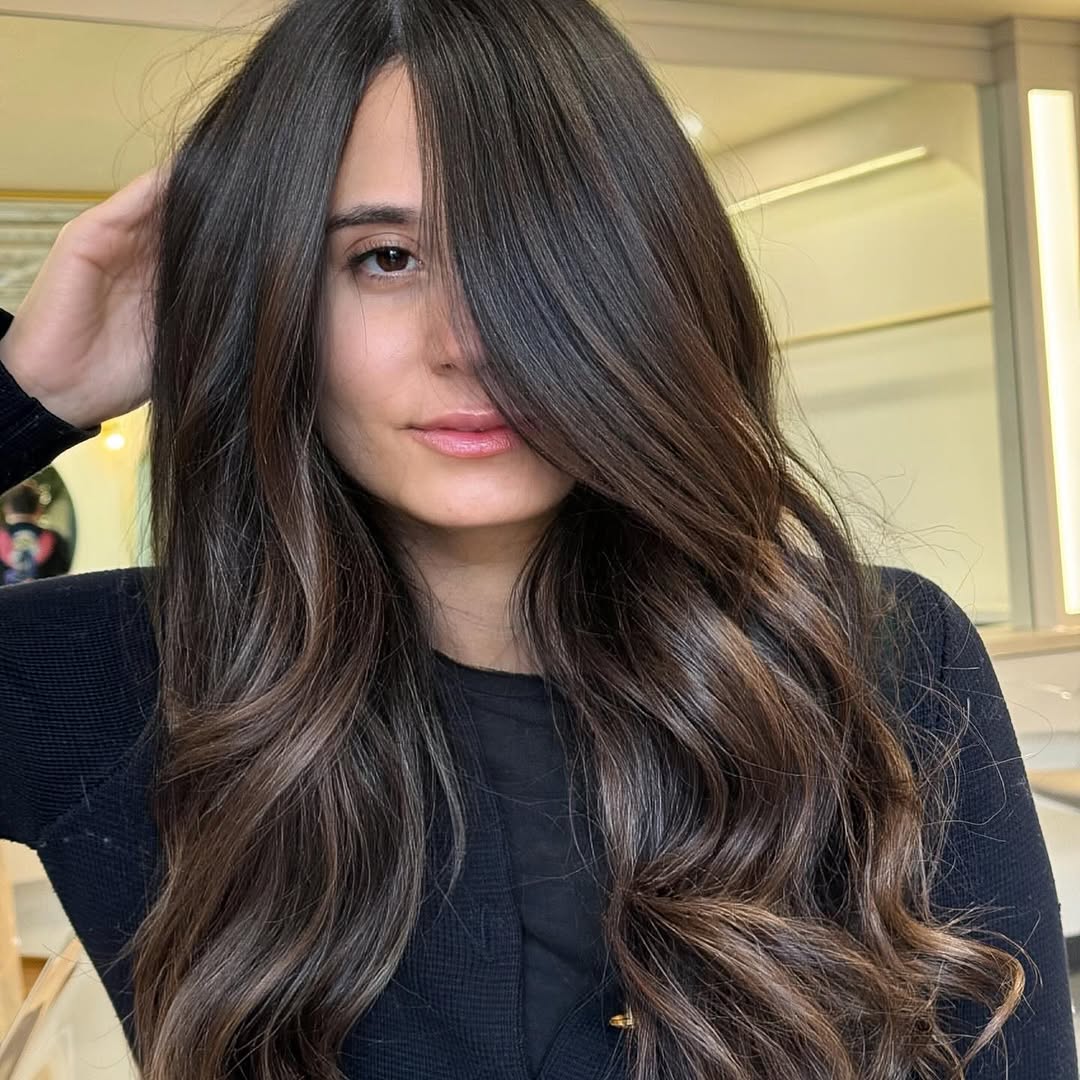 10. Deep Curtain Bangs with Espresso Waves