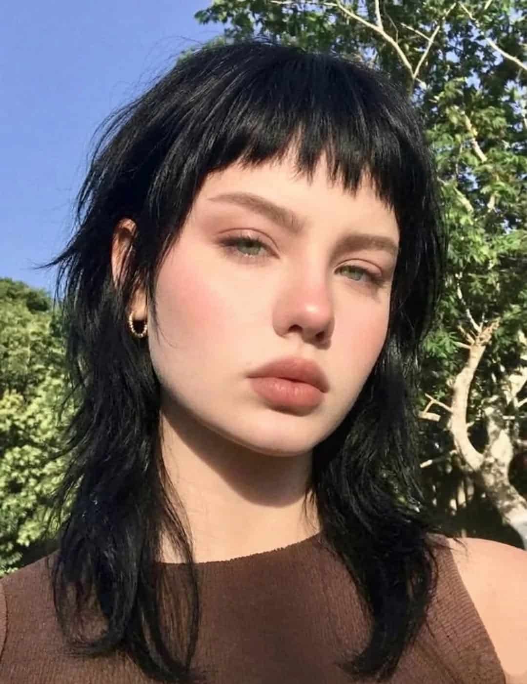 2. Edgy Shaggy Bob with Micro Bangs