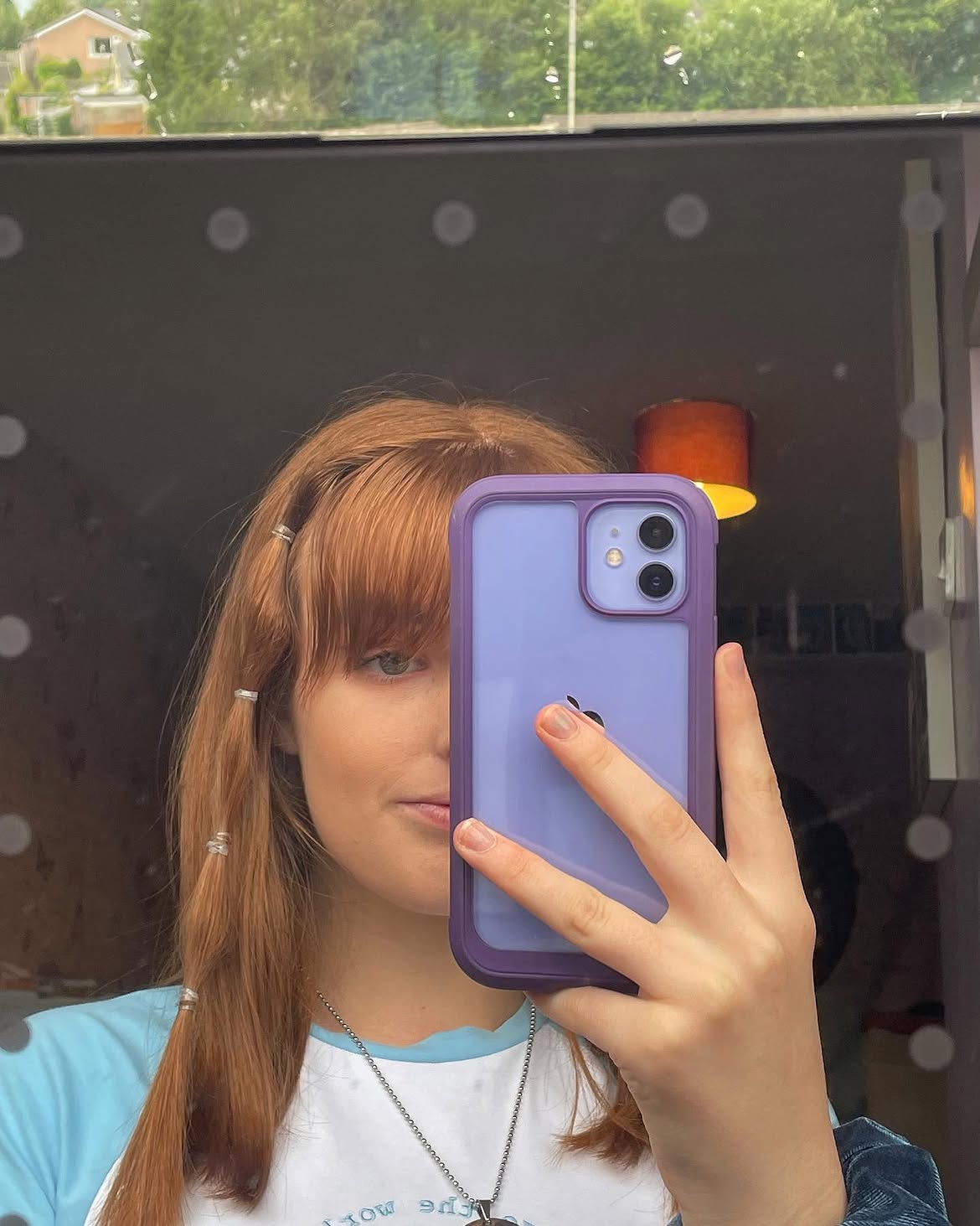 2. Face-Framing Beaded Tendrils with Chunky Bangs