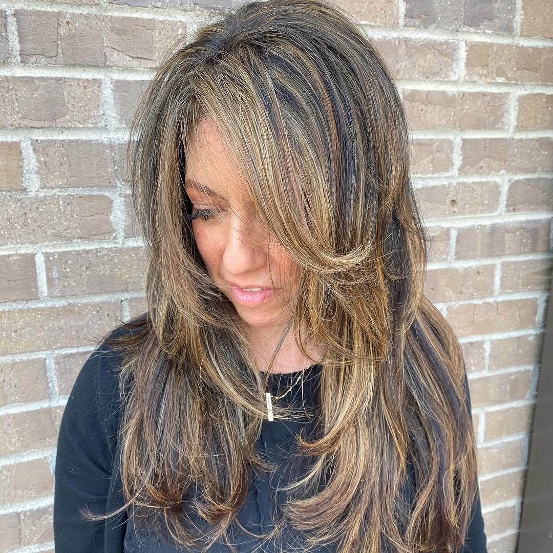 4. Face-Framing Layers with Honey Highlights
