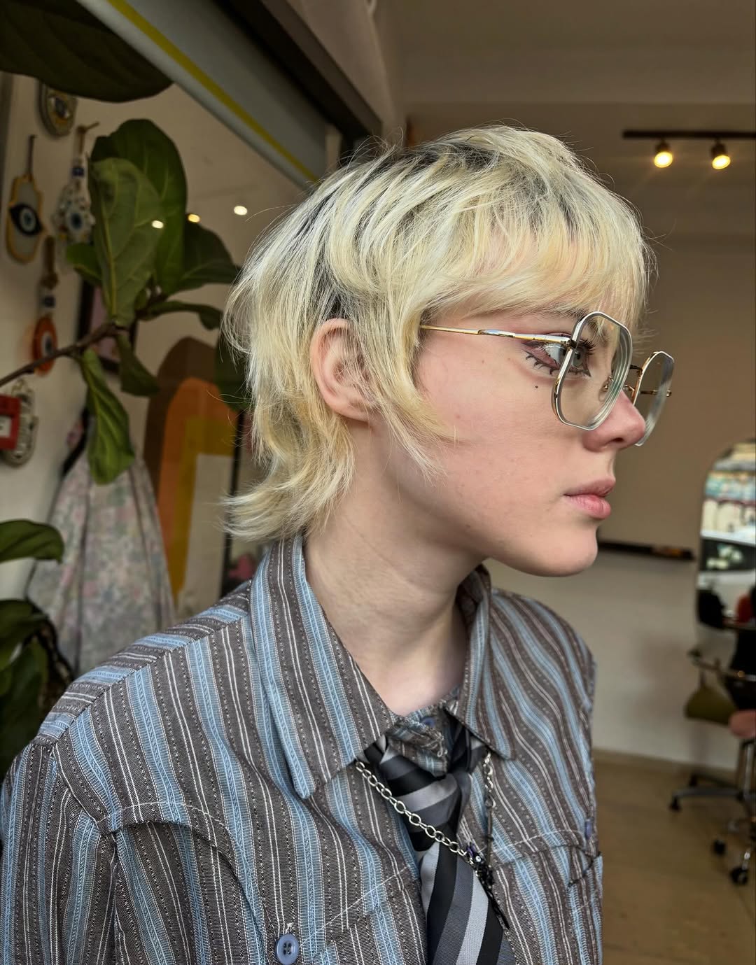 4. Feathered Blonde Shag Pixie