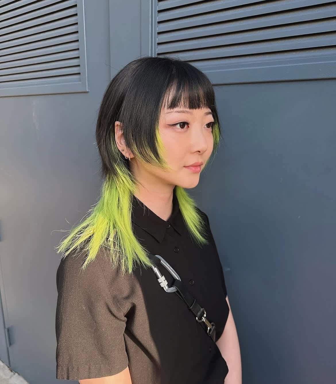 3. Neon-Tipped Wolf Cut with Micro Bangs