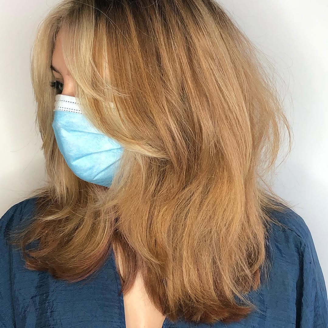 3. Piecey Layers with Soft Curtain Bangs