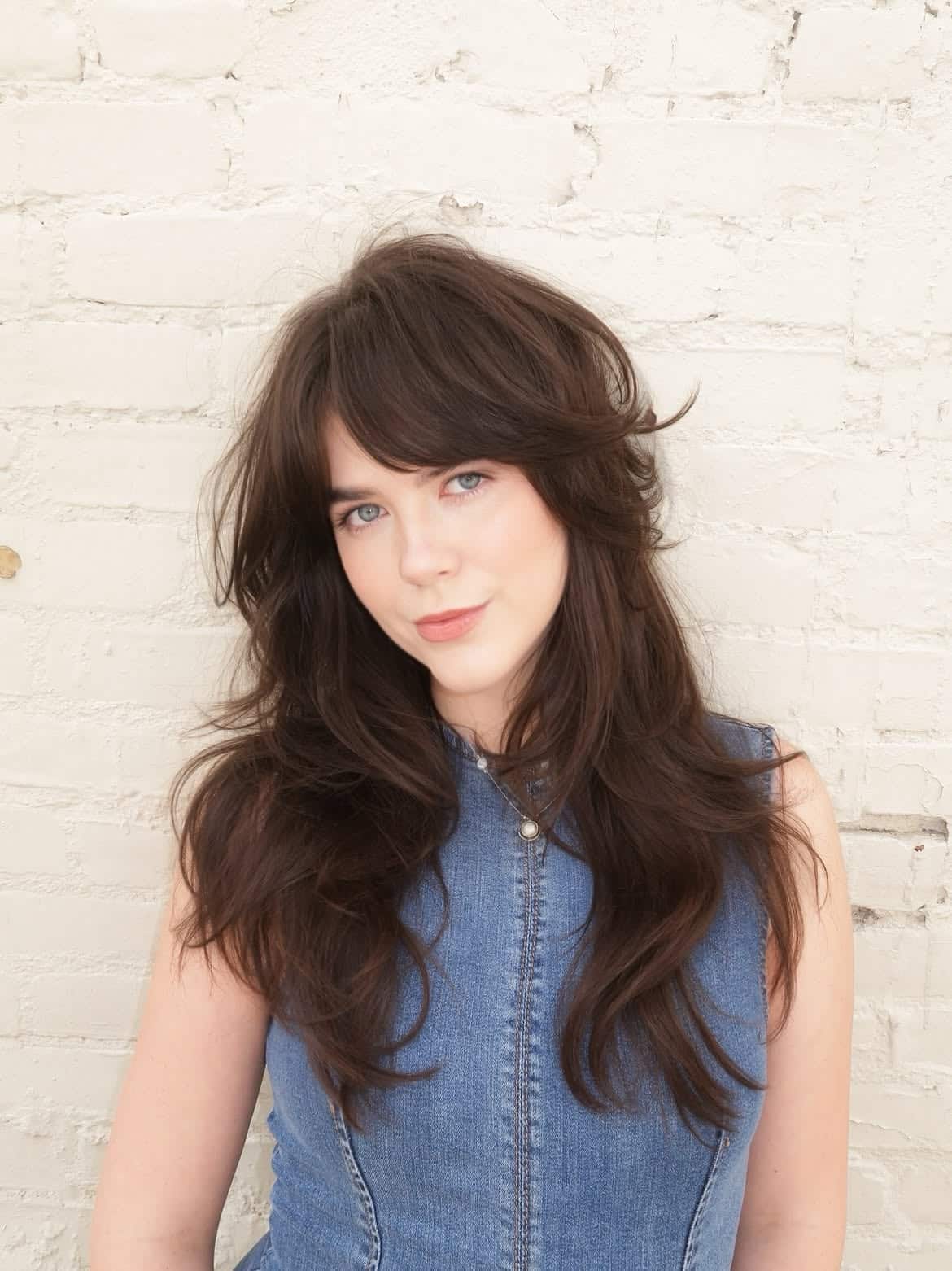 9. Shaggy Layers with Curtain Bangs