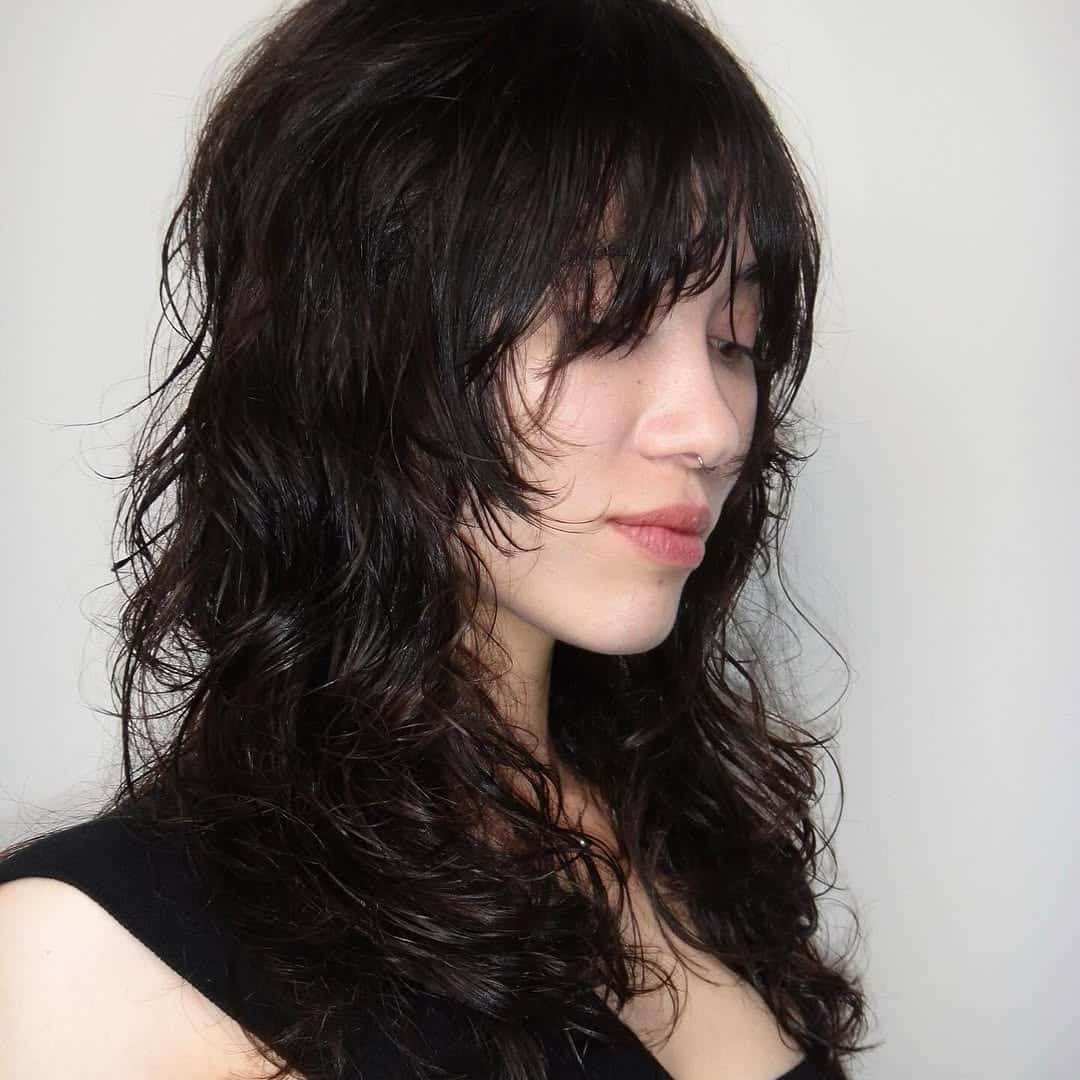 5. Shaggy Layers with Wispy Bangs