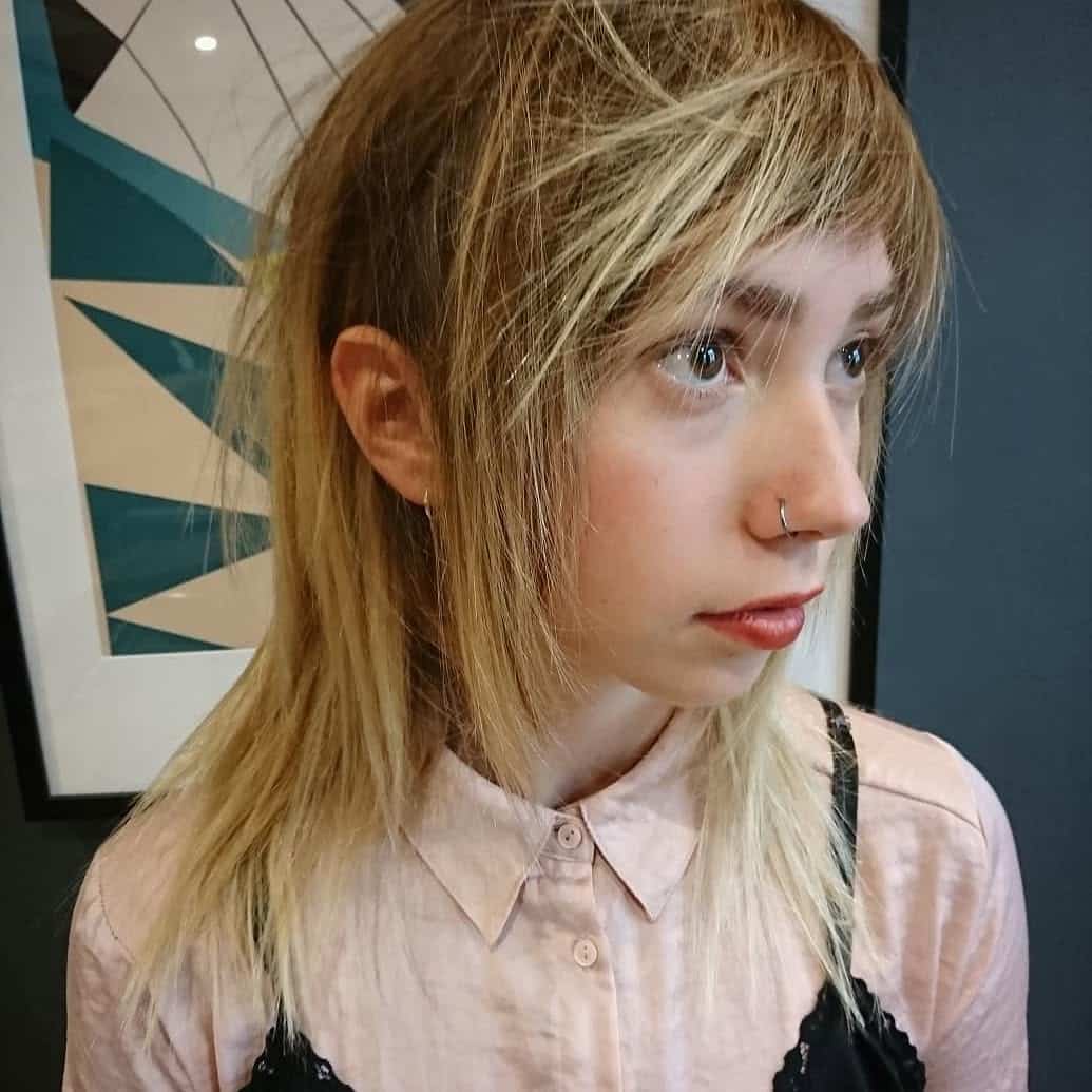 2. Shaggy Textured Pixie with Wispy Bangs