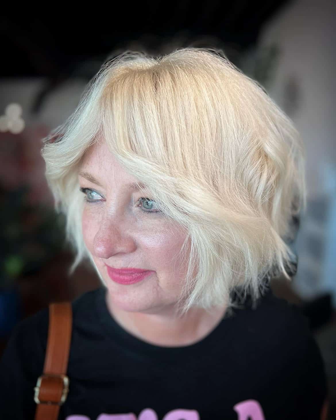 5. Soft Shaggy Blonde Bob with Wispy Side Bangs