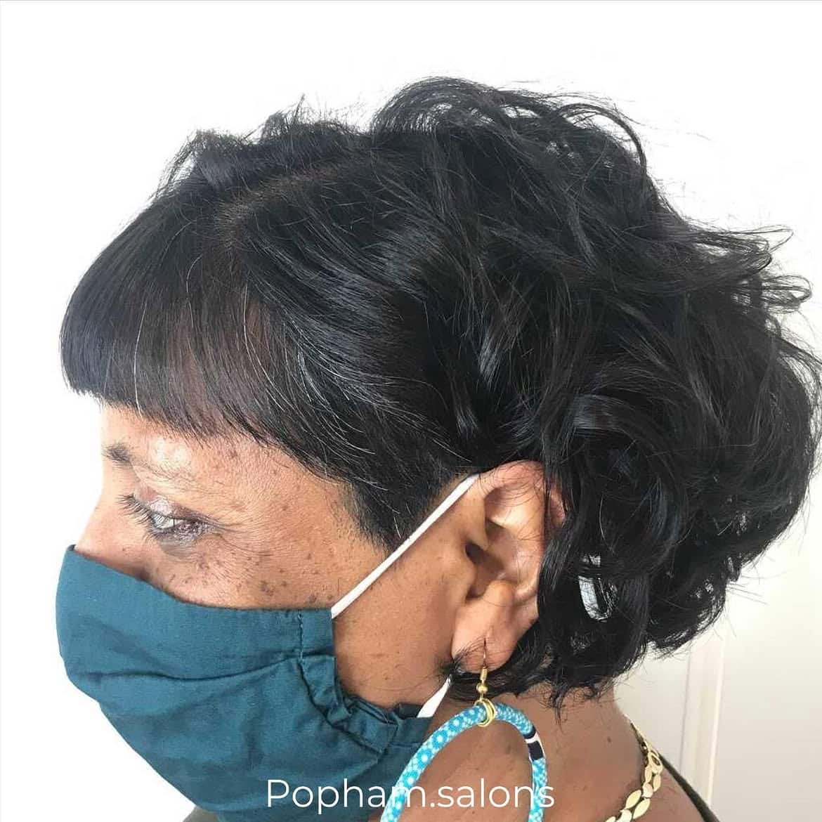 15. Textured Curly Bob with Bangs