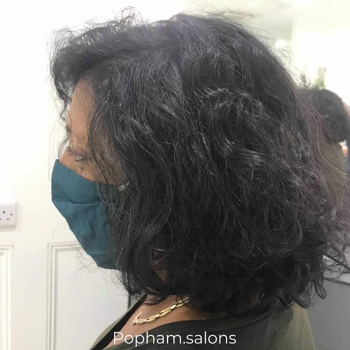 16. Textured, Voluminous Curly Bob
