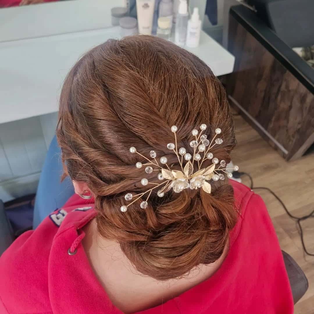 3. Twisted Low Bun with Pearl Branch Pin