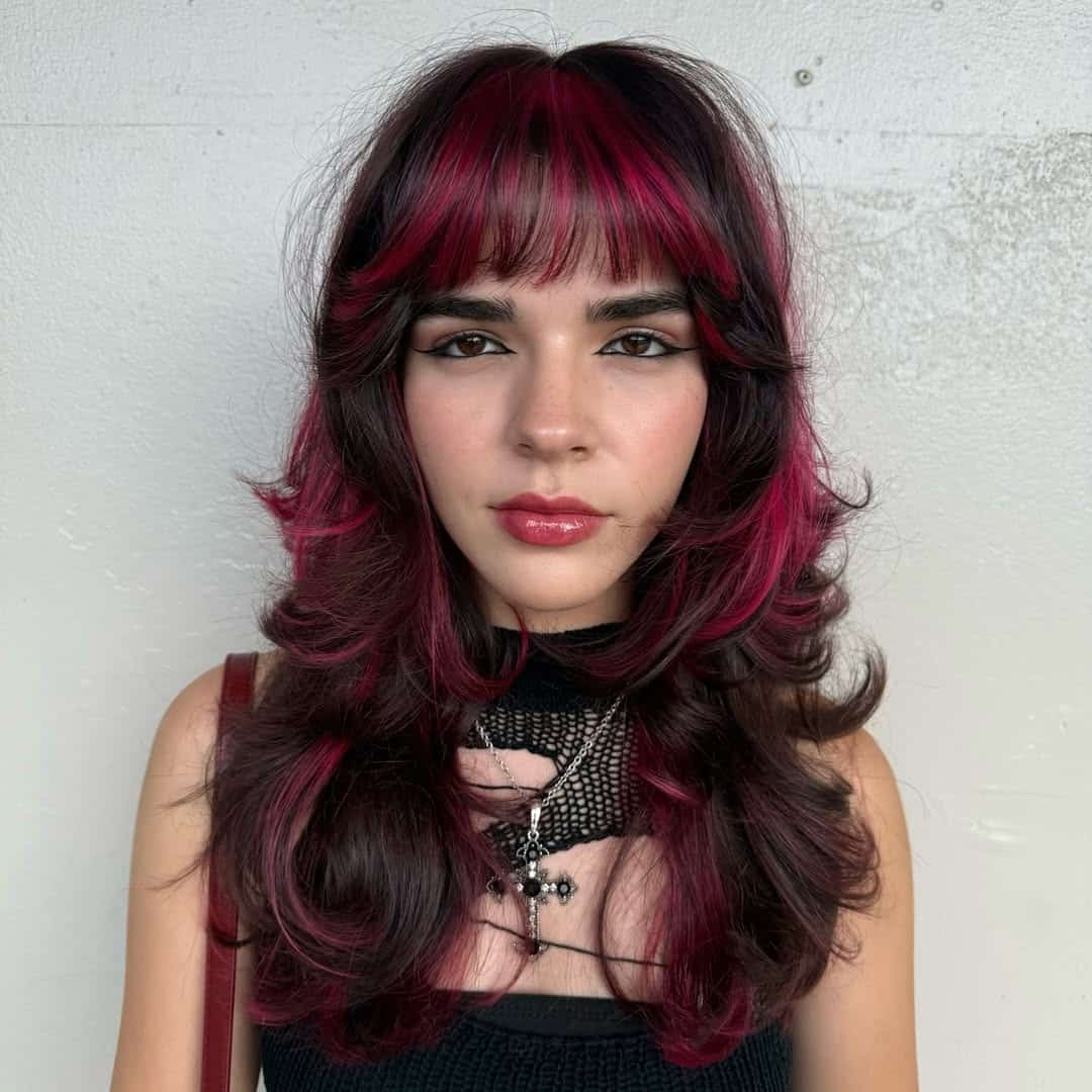 18. Voluminous Layers with Neon Pink Highlights