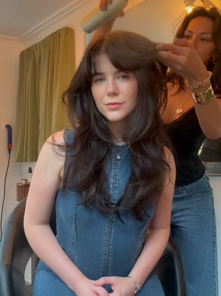 10. Wispy Layers with Full Curtain Bangs